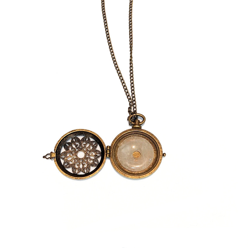 RAIN: BRONZE LOCKET WITH MILKY QUARTZ